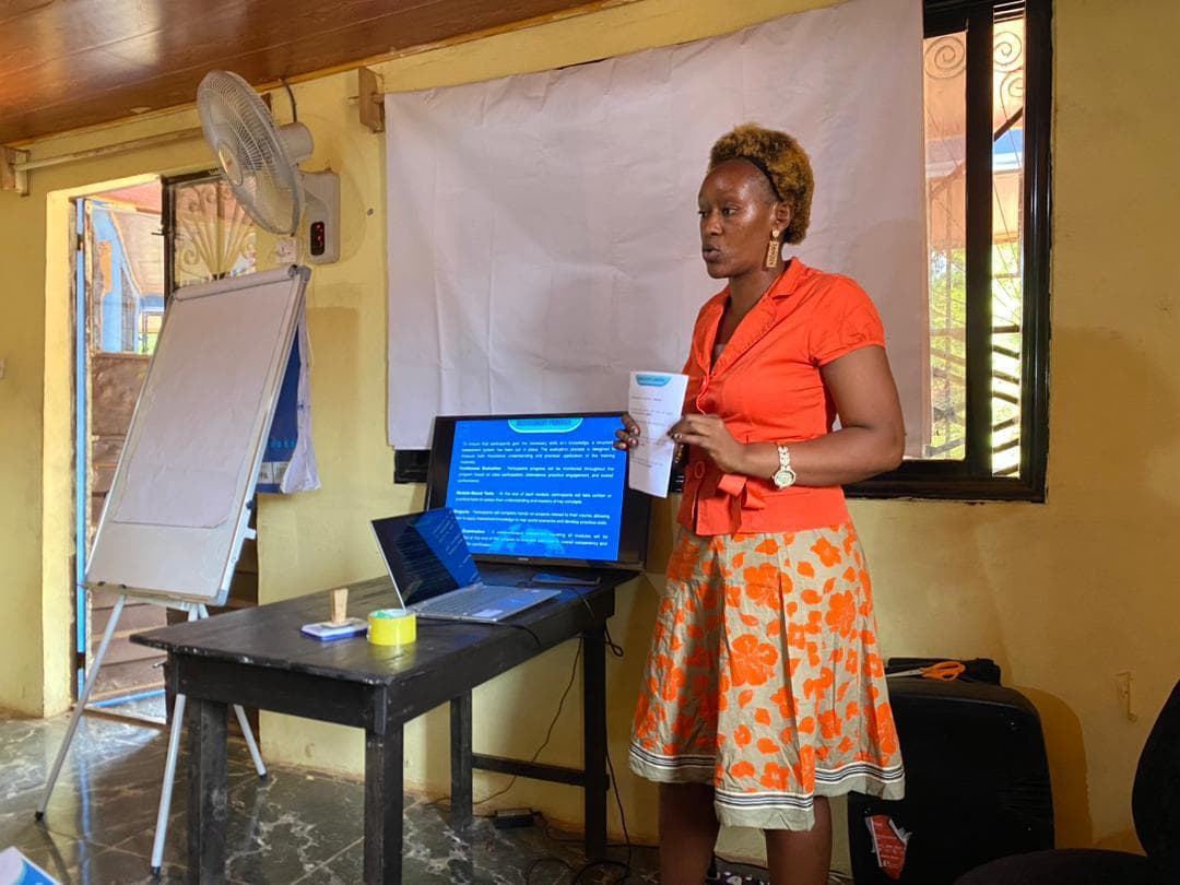 Woman helping children in Sierra Leone